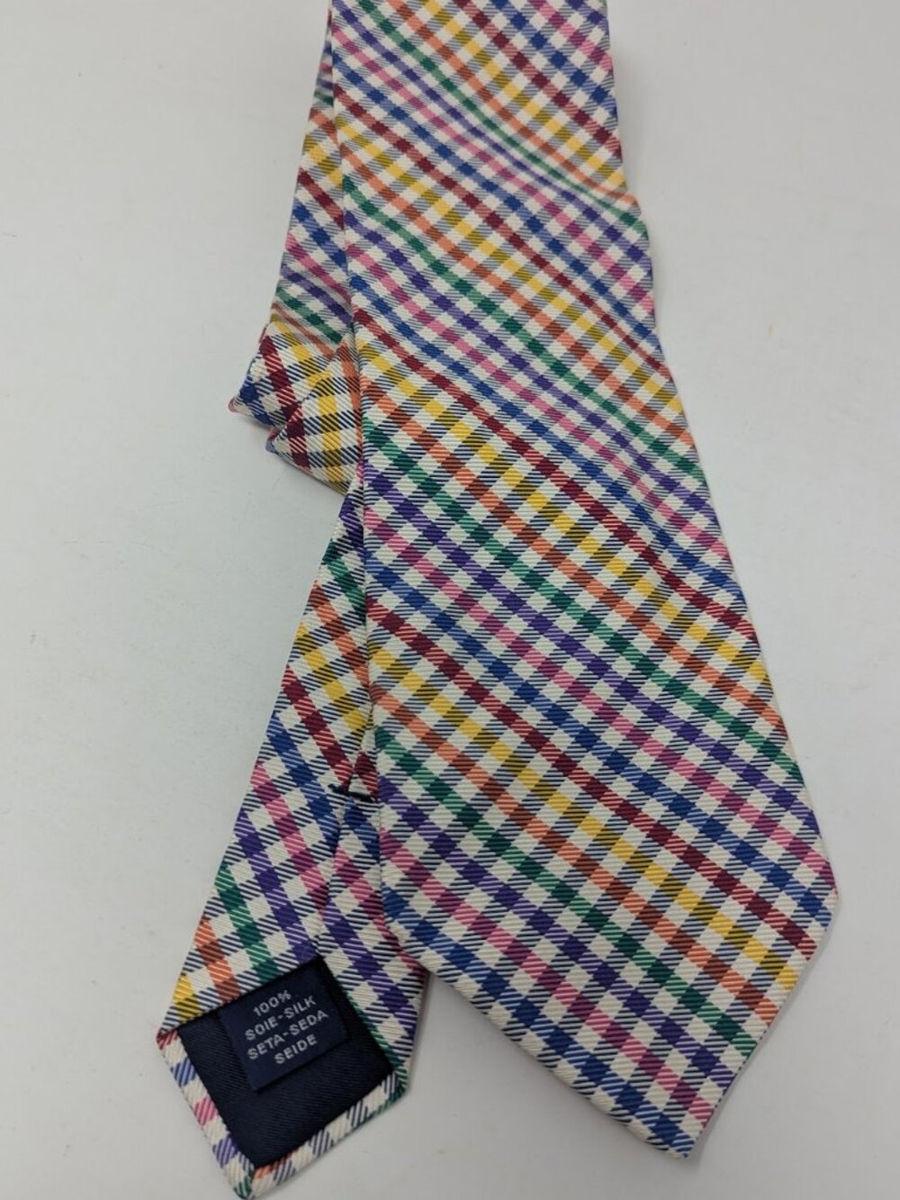 Breuer tie in colorful stripes. Excellent condition, 3.25" across Made in France